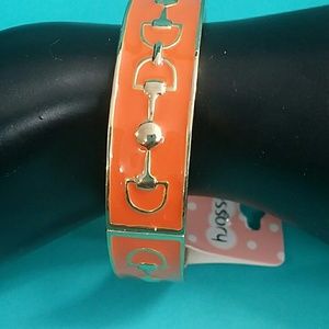 Gold tone orange horse stir-up bracelet